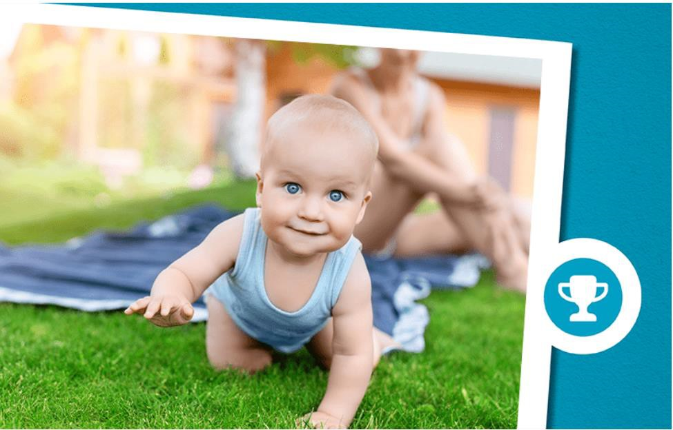 baby crawling on the grass