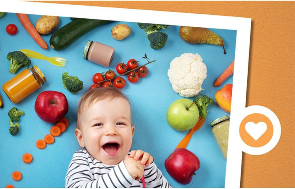 smiling boy with veggies behind him