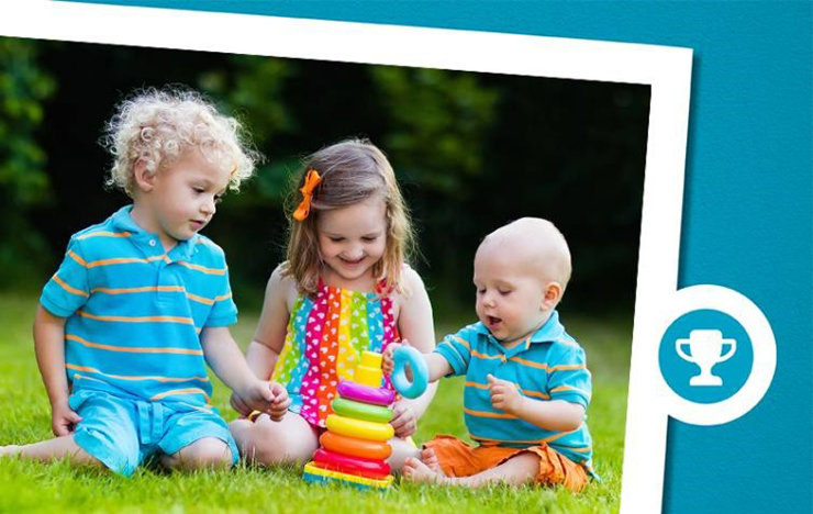 3 kids sharing a toy